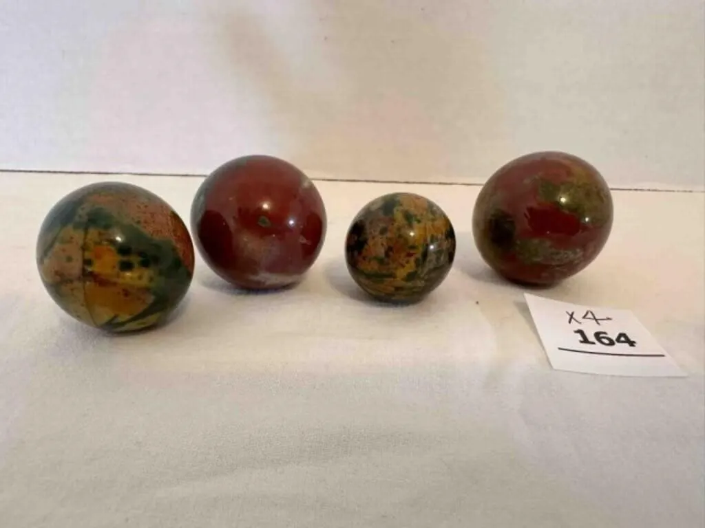 4 Polished Marbles Quartz? Largest are 1.25