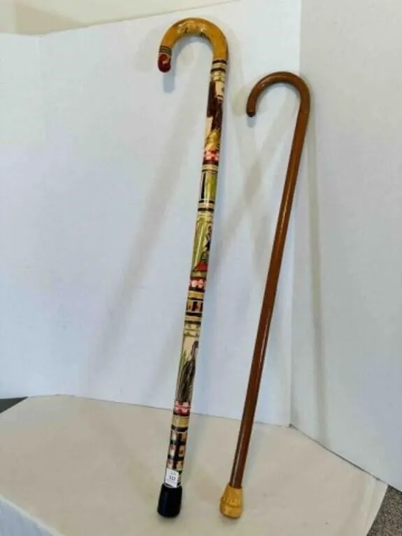 2 Wood Canes-1 has native carving