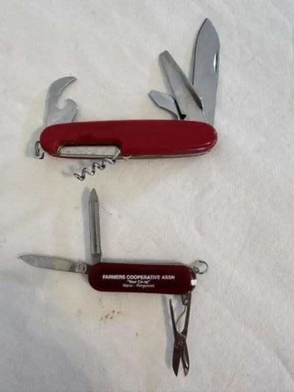 2 Red Swiss Army style pocket knives