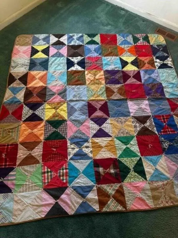 Quilt 75"x80" machined pieced, hand tied