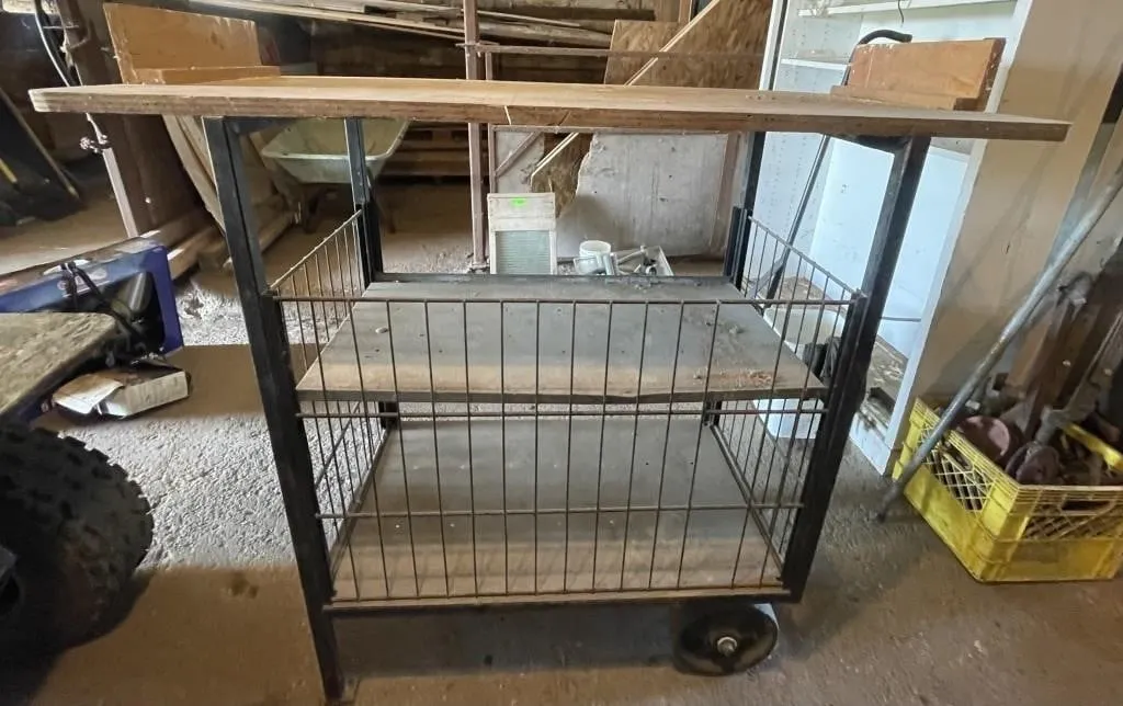 Shop-built portable work cart with shelves.