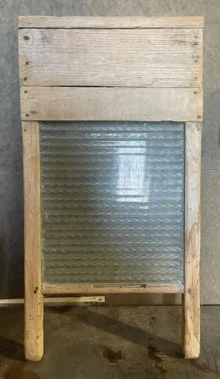 Vintage wooden washboard with textured glass