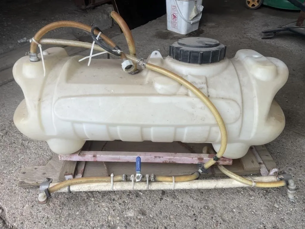 Utility sprayer tank mounted on a wooden frame