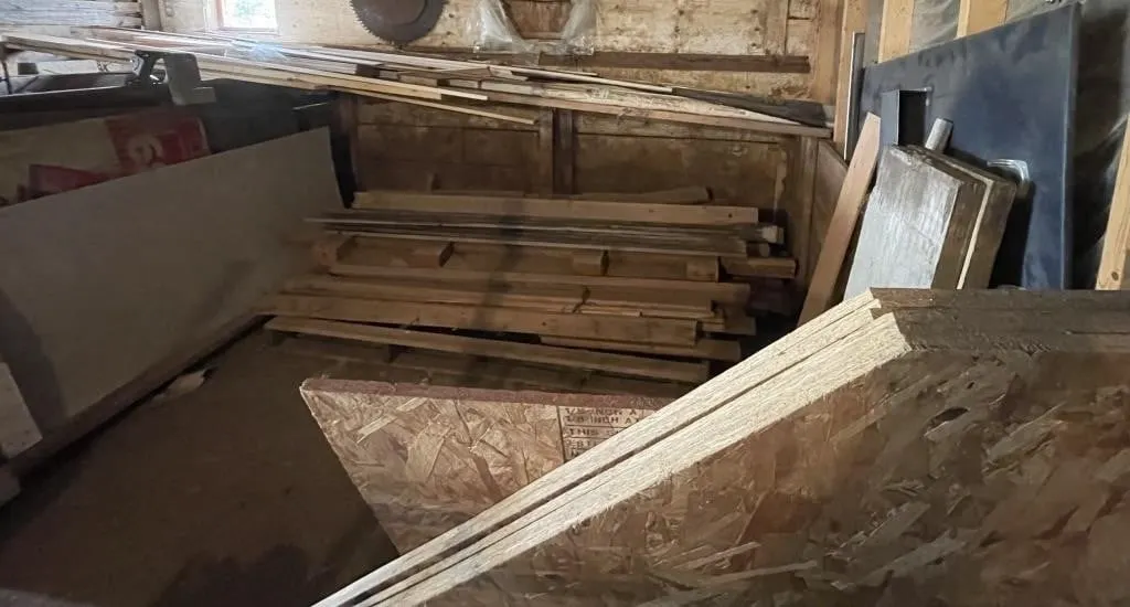 Pile of assorted dimensional lumber, OSB