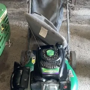 Weed Eater push lawn mower with a 140cc OHV550