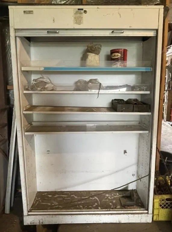 Vintage metal roll-top storage cabinet with
