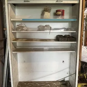 Vintage metal roll-top storage cabinet with