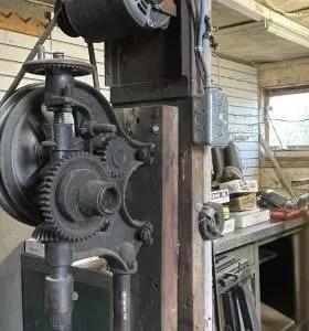 Vintage wall-mount drill press. Works. Buyer must