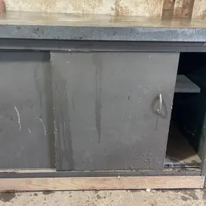 Heavy duty shop cupboard with metal countertop.