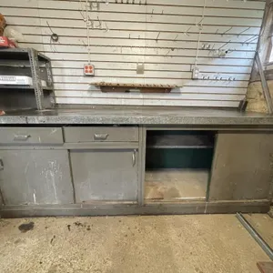 Heavy duty shop cupboard with metal countertop.