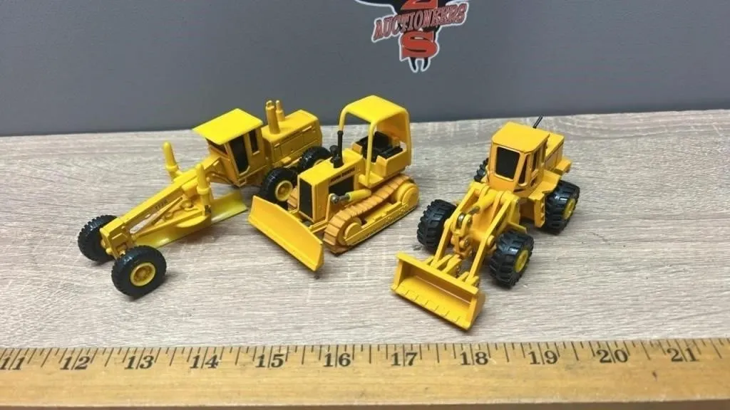 Three 1:64 Construction Toys.