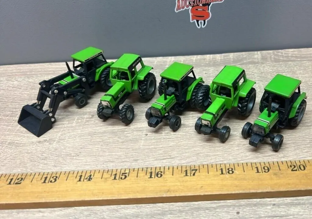 Five 1:64 Deutz Tractors.