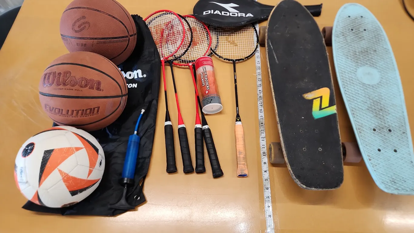 Assorted sports equipment skate boards