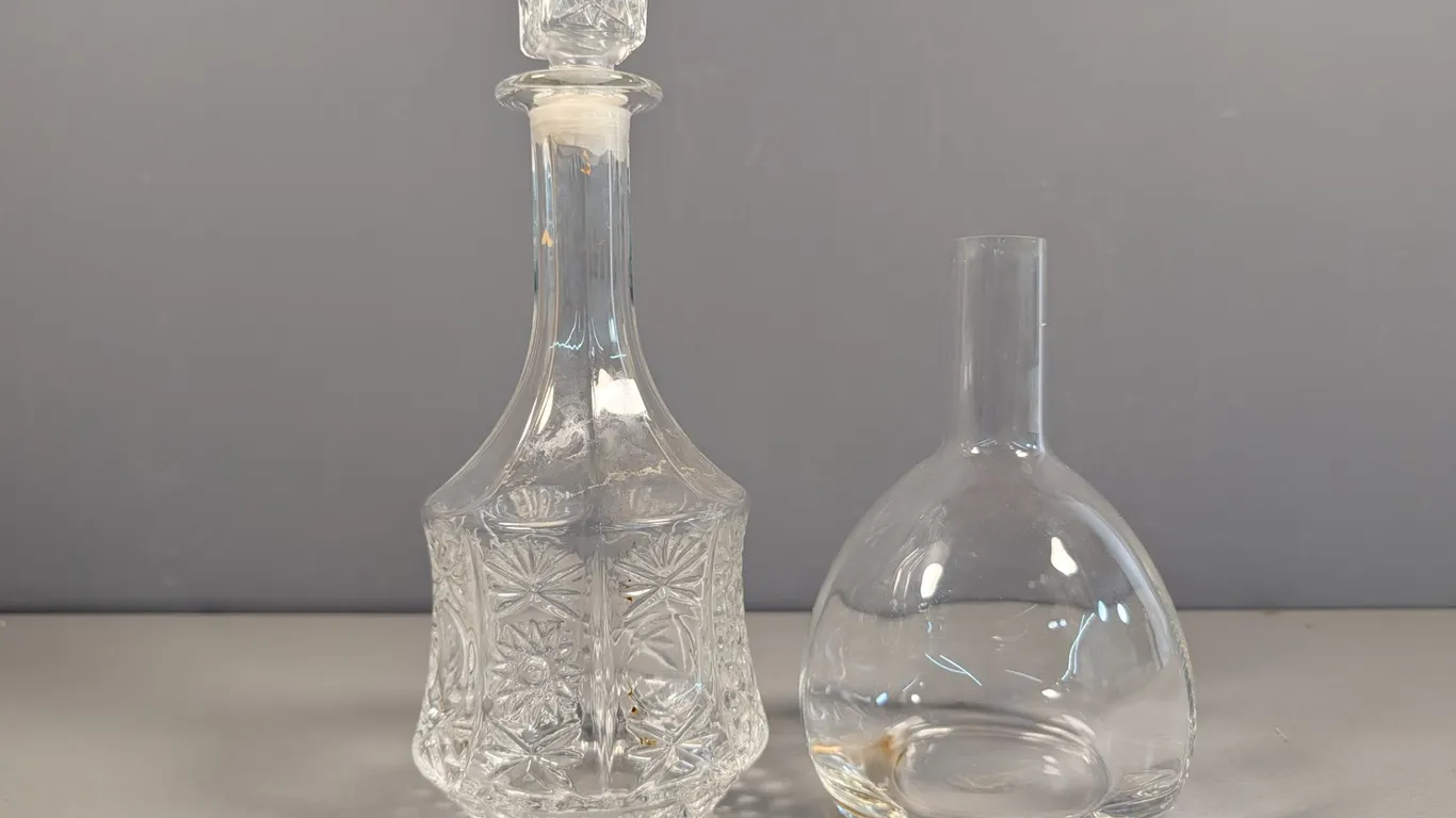 Cut Glass Decanter and Clear Glass Bottle