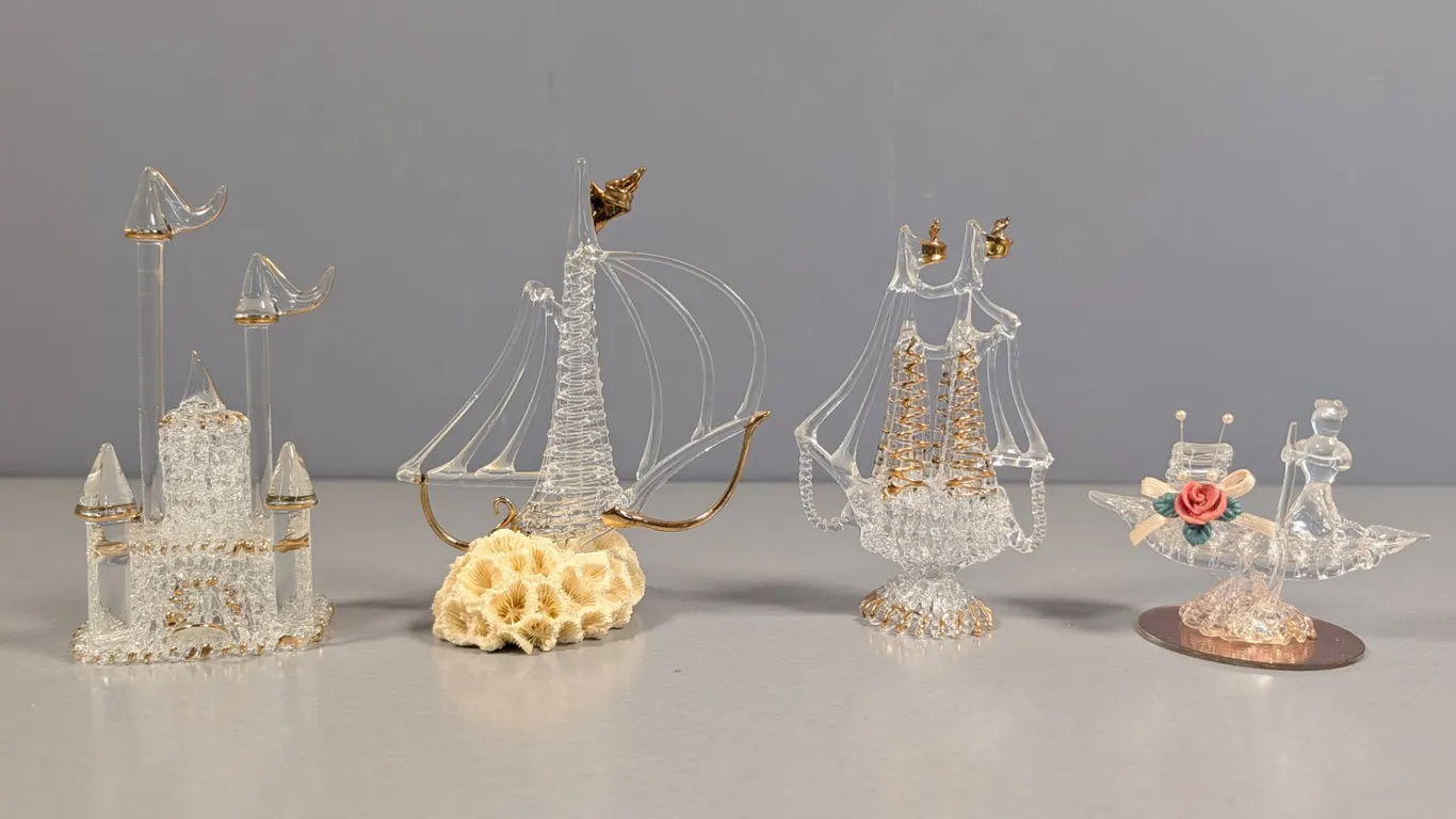 Collection of Clear Glass Figurines with Gold Accents