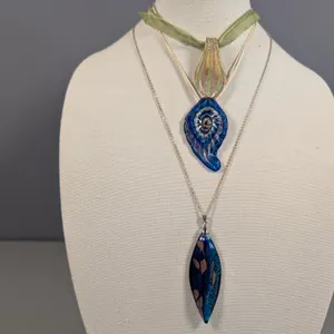 Three Artisan Glass Pendants