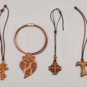 Collection of Wooden Religious Pendants and Cords