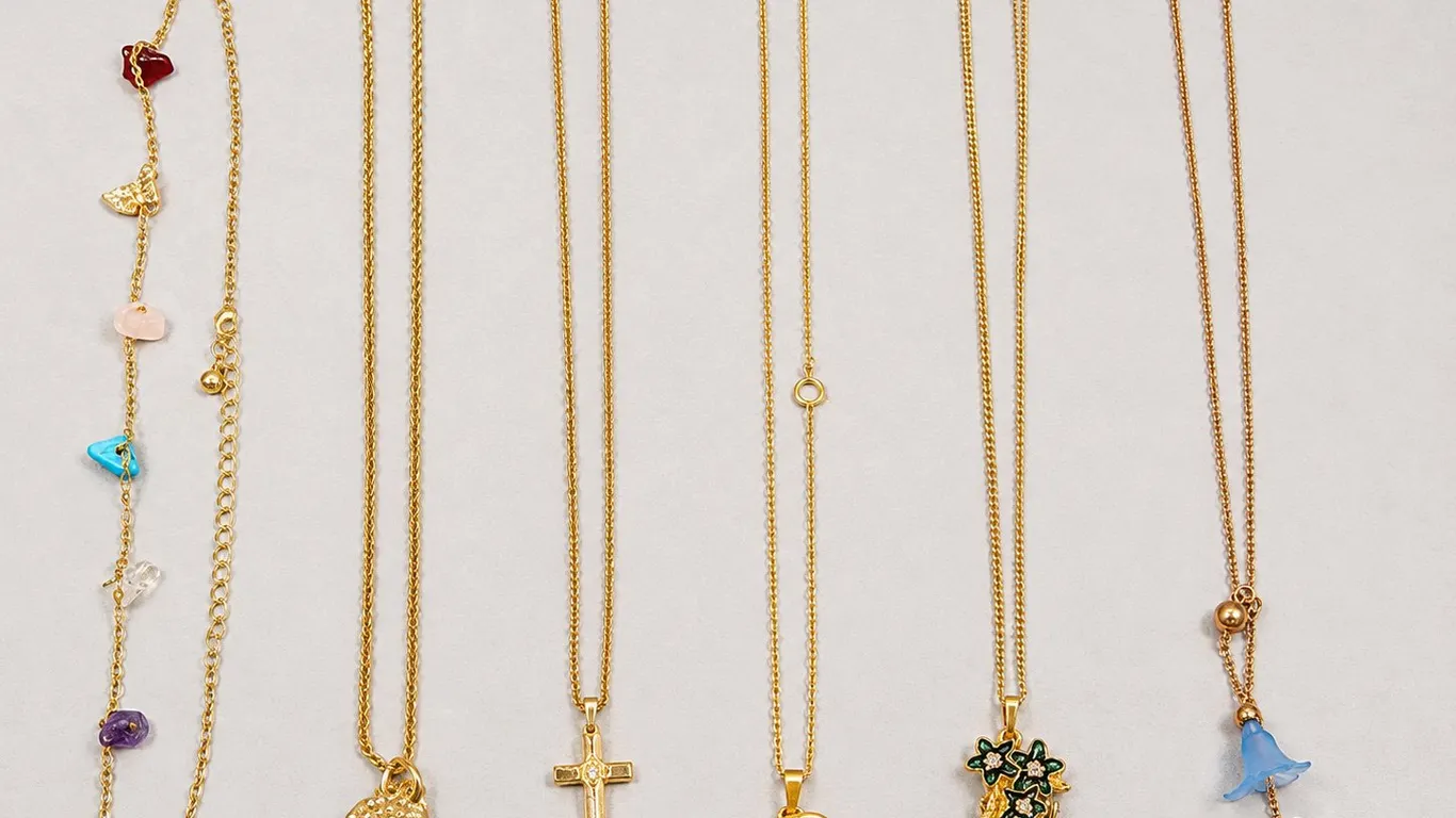 Collection of Six Gold-Tone Necklaces with Pendants