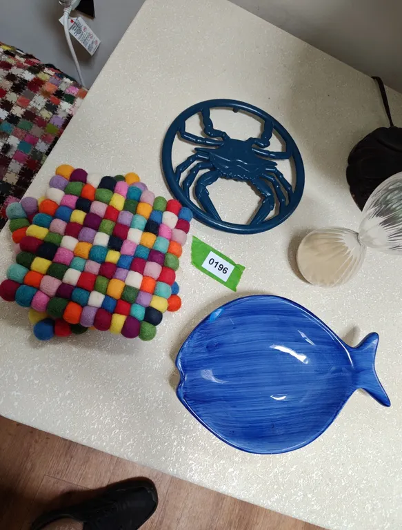 Colorful Felt Trivet, Blue Ceramic Fish Dish, and Crab Wall Decor