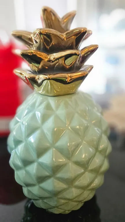 Ceramic Pineapple Figurine and Gold Plastic Place Mats