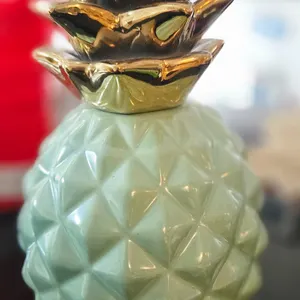 Ceramic Pineapple Figurine and Gold Plastic Place Mats