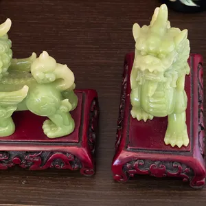 Pair of Green Foo Dog Statues on Carved Bases