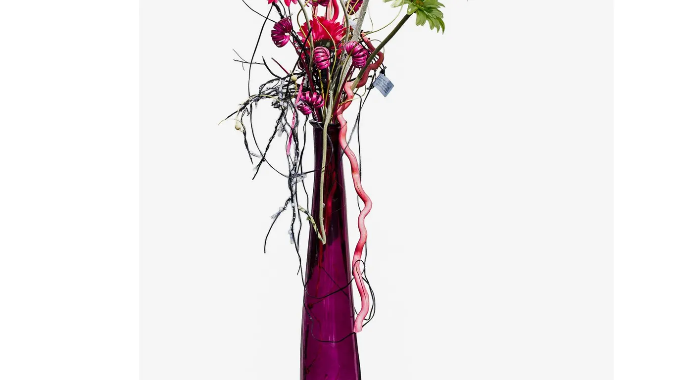 Tall Purple Glass Floor Vase with Floral Arrangement