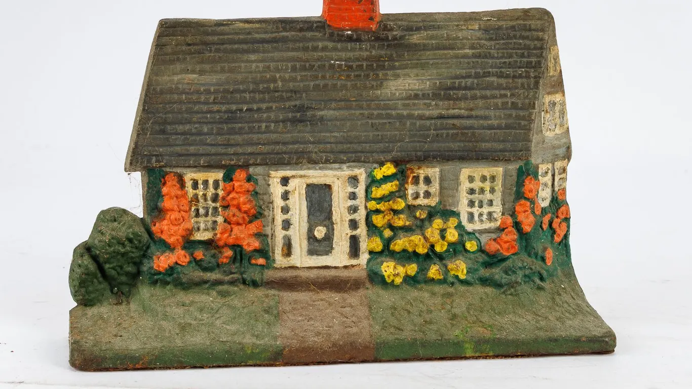 Vintage Cast Iron Cottage Doorstop