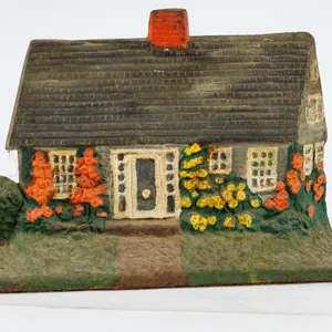 Vintage Cast Iron Cottage Doorstop