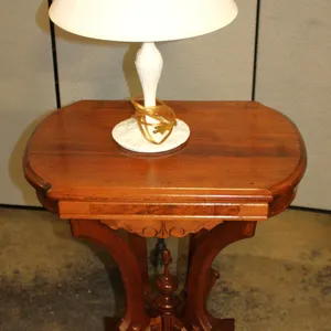 Wood Pedestal Table and White Table Lamp