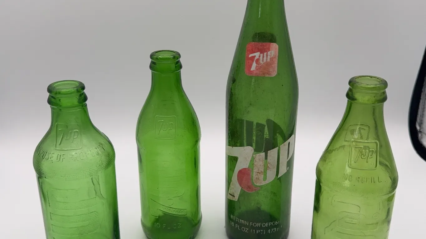 4 7UP Bottles