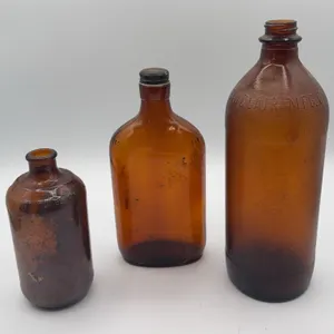Three Brown Glass Bottles Sinclair Edgar