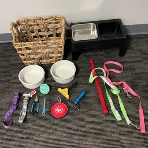 Comprehensive Dog Care Bundle with Assorted Collars, Leashes, Bowls, Grooming Tools, and Storage Bas