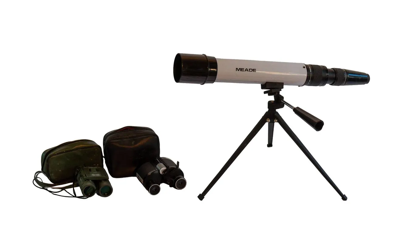MEADE TELESCOPE WITH TASCO AND NIKON BINOCULARS.