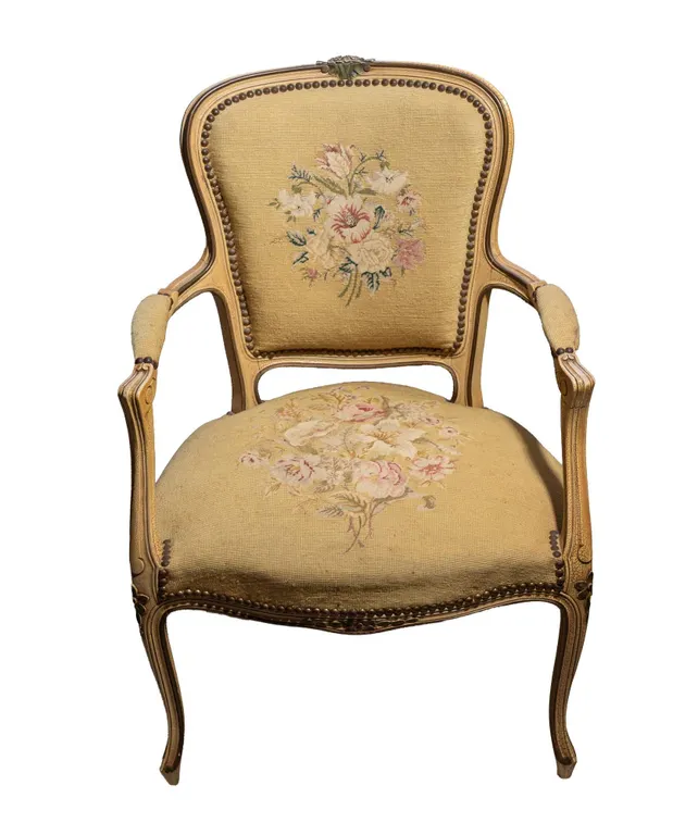 UPHOLSTERED EMBROIDERED CHAIR WITH FLORAL MOTIF DECORATION.