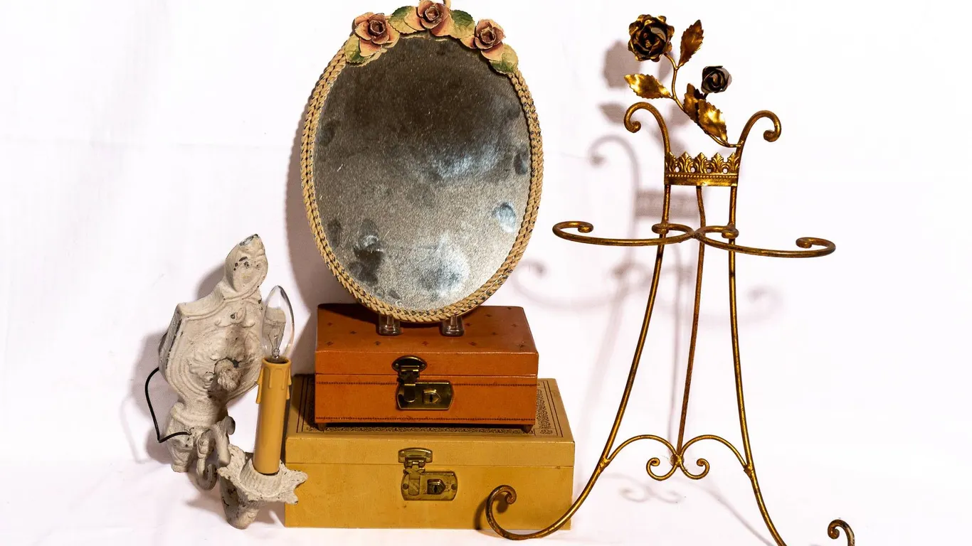 TOLE MIRROR, JEWELRY BOXES, EASEL, AND WALL SCONCES.