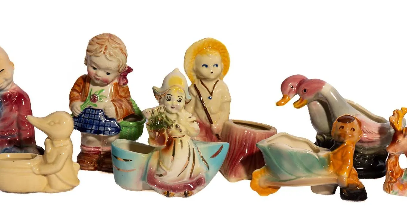 FIGURE PORCELAIN PLANTERS INCLUDING ROYAL COPLEY.