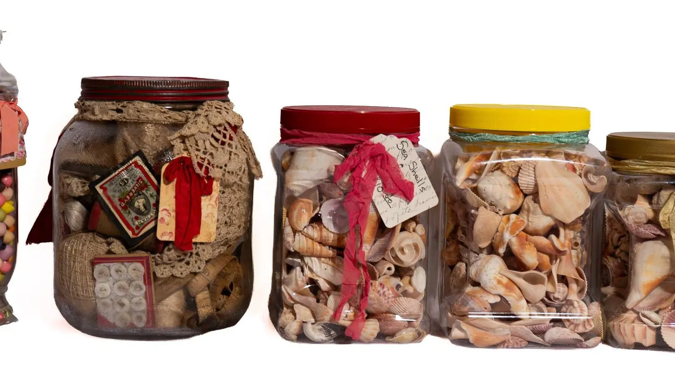 DECORATIVE BUTTONS, SHELLS, AND TRIMMINGS IN CONTAINERS.