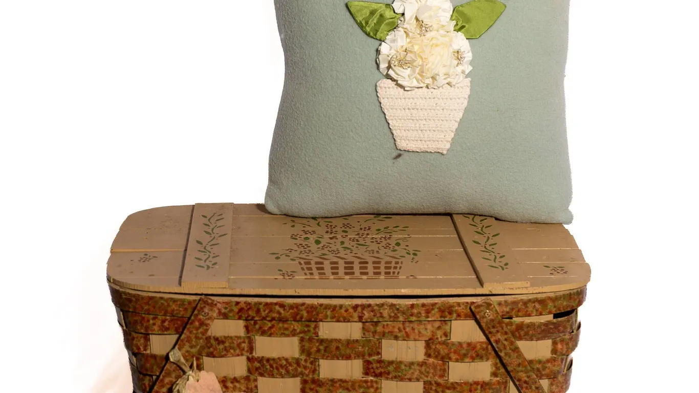 HAND PAINTED BASKET WITH HINGED LID AND PILLOW.