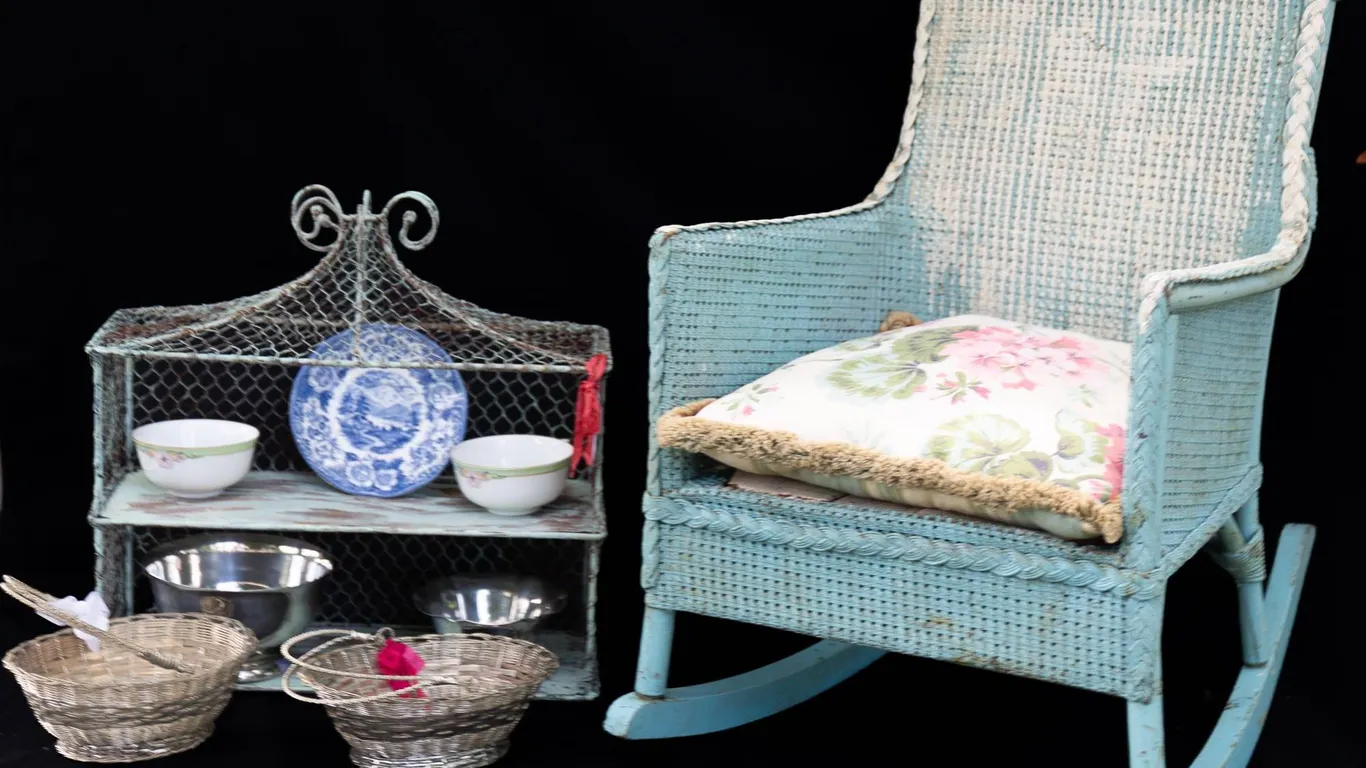 CHILD'S WICKER ROCKER, WIRE BASKETS, WIRE SHELF, TEA CUPS, SILVER PLATE.