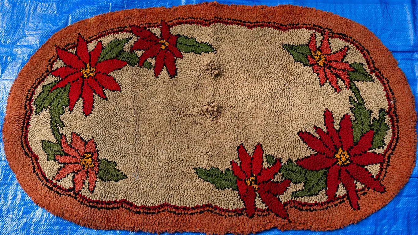 HOLLY HOOKED RUG 48" H., 28" W.