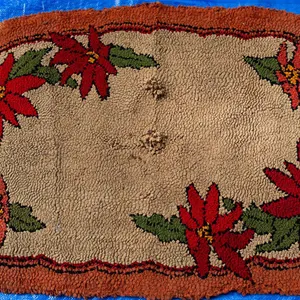 HOLLY HOOKED RUG 48" H., 28" W.