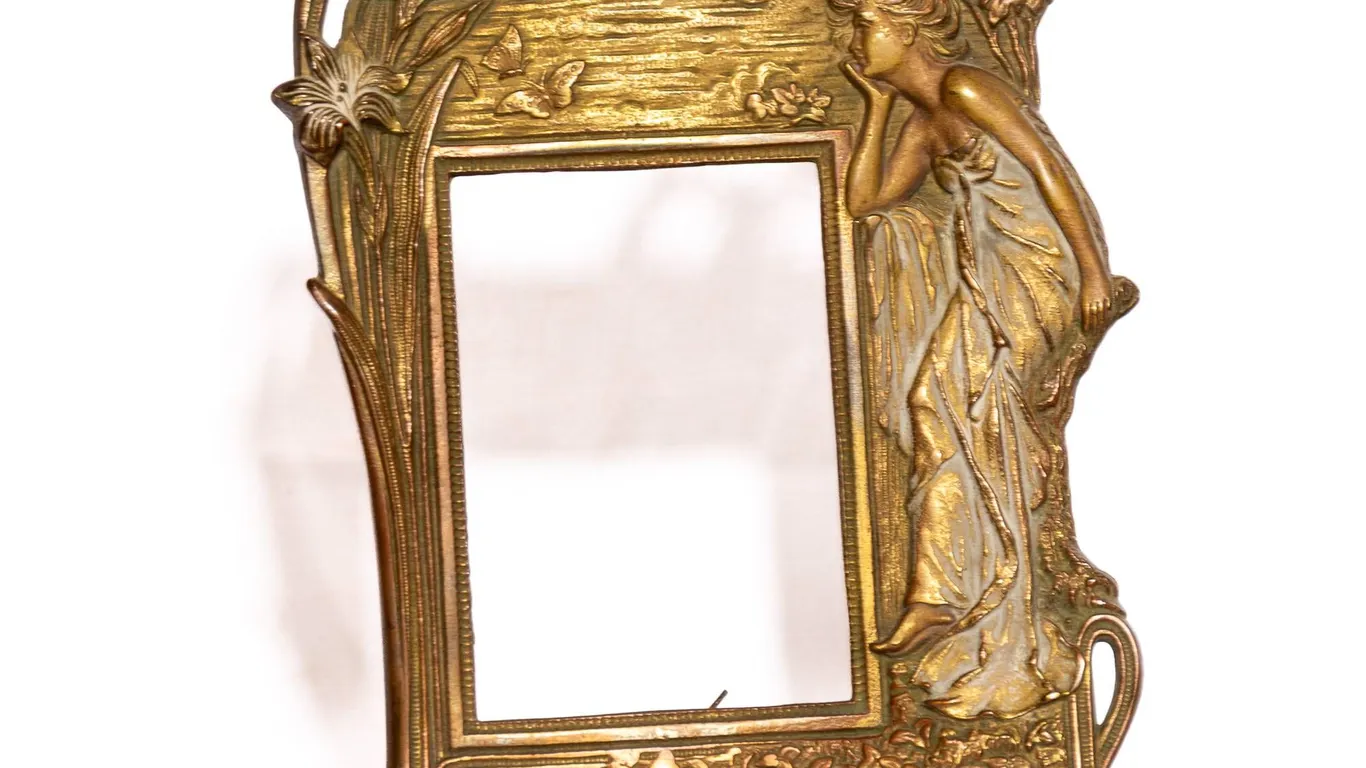 ART NOUVEAU CAST METAL PICTURE FRAME WITH EASEL.