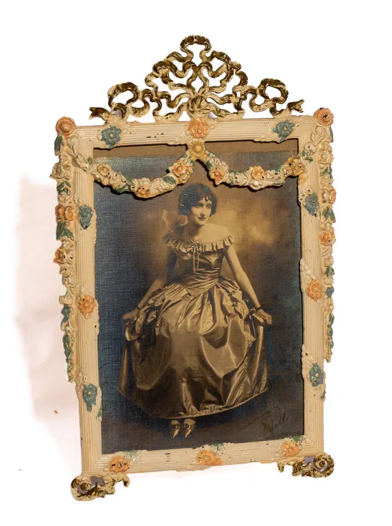 ORNATE IRON FRAME WITH ORIGINAL PHOTOGRAPH.