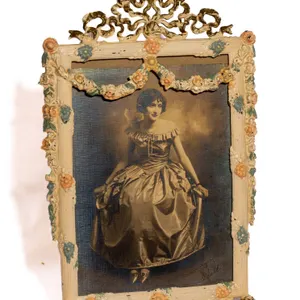 ORNATE IRON FRAME WITH ORIGINAL PHOTOGRAPH.