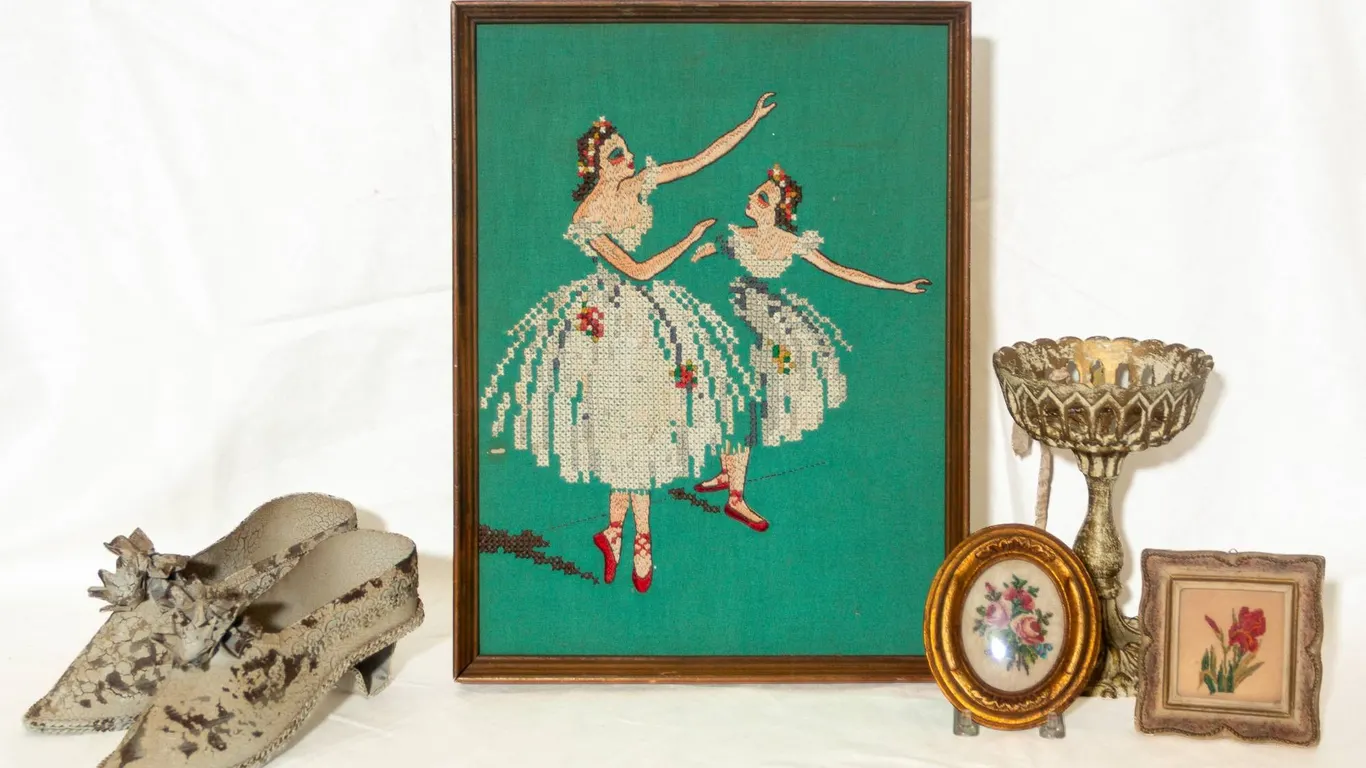METAL HANGING SHOES, BALLET NEEDLEWORK, EMBROIDERIES, AND ORNATE COMPOTE.