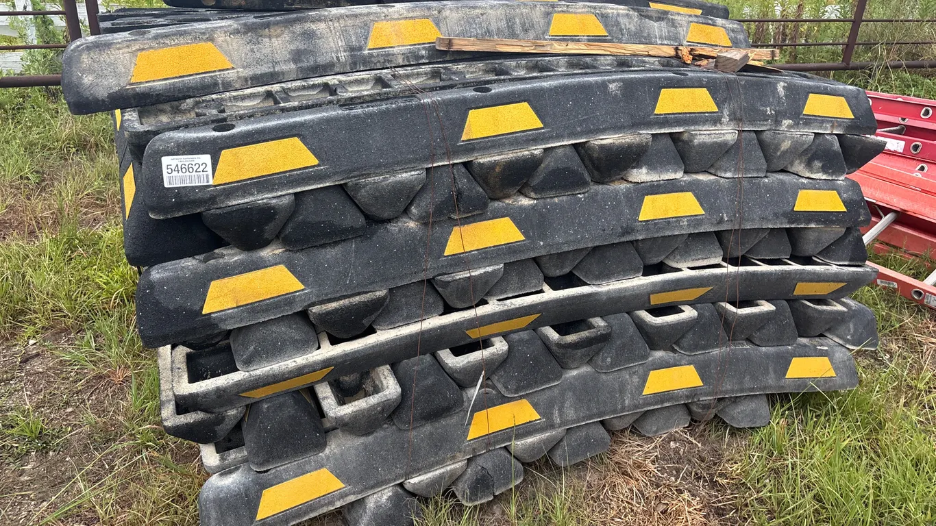 QTY OF RUBBER PARKING CURBS