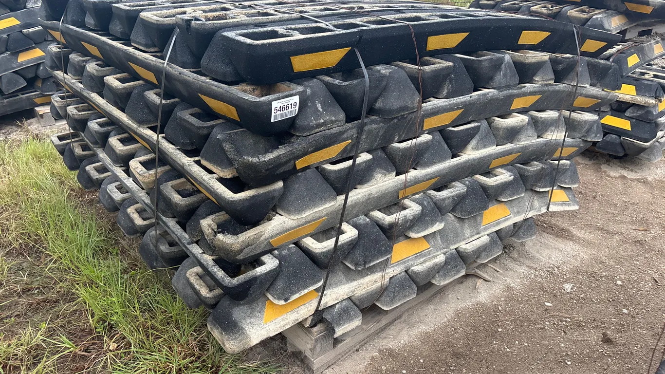 QTY OF RUBBER PARKING CURBS