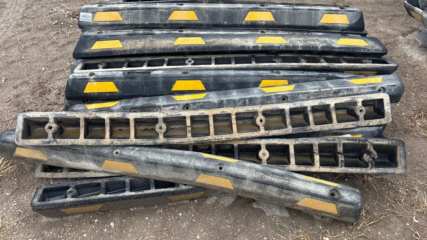 3 PALLETS OF RUBBER PARKING CURBS