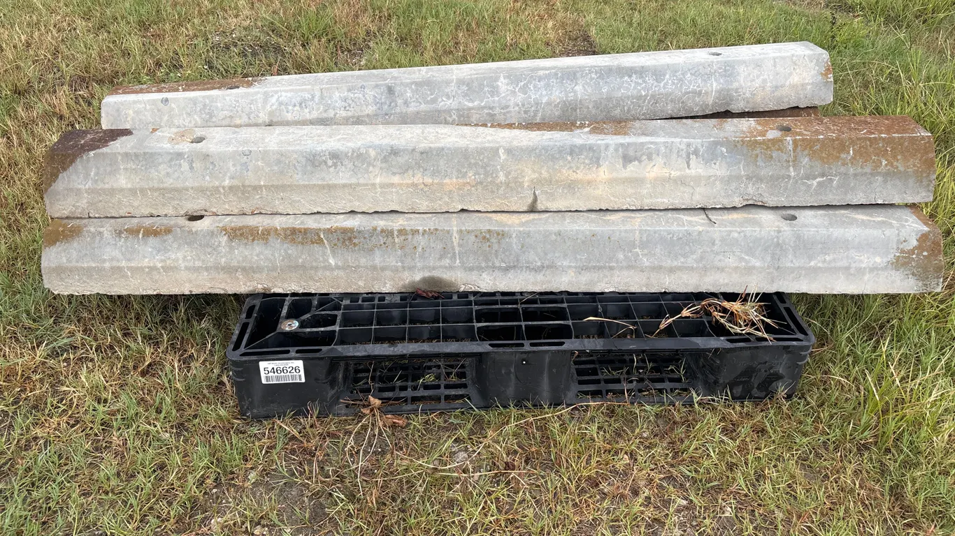 QTY (13) CONCRETE PARKING CURBS